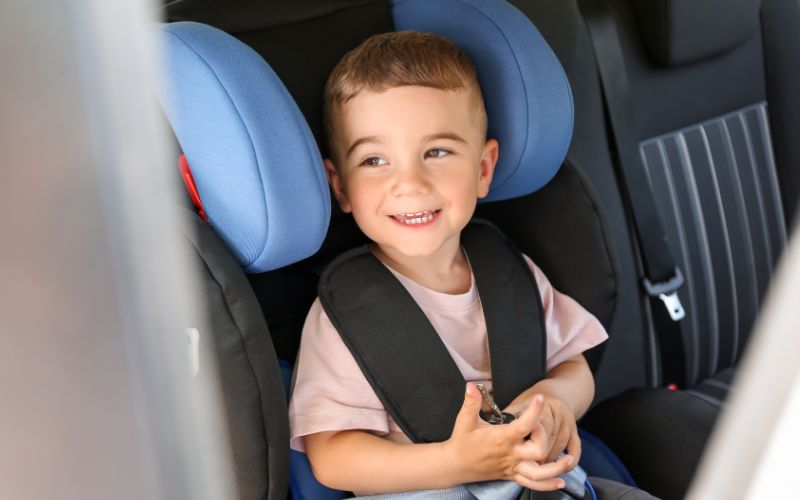 Boy in his car seat